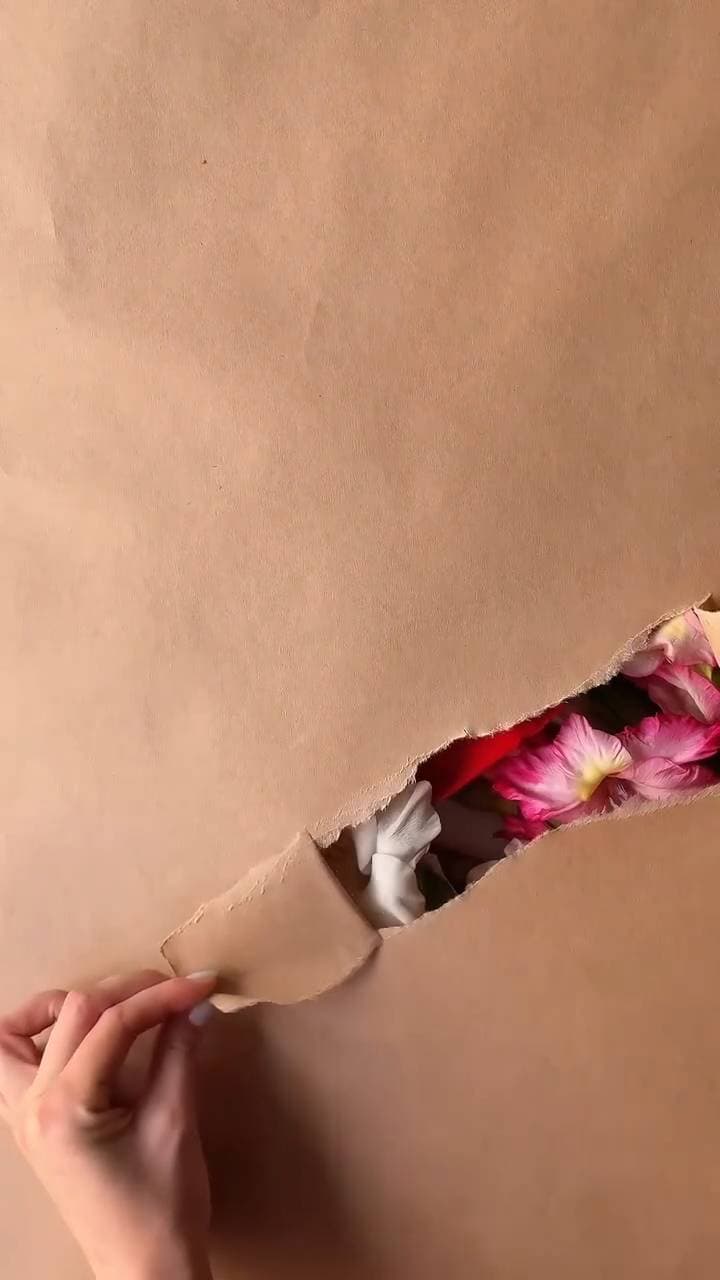 Poster for Tear open the paper to reveal the flowers